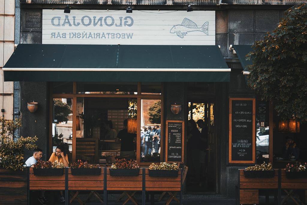 Krakow main square with historic buildings and outdoor cafes